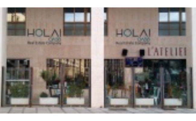 franquicia hola real estate company 2